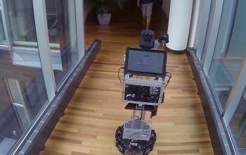 cobot robot in a hallway
