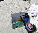 Photo of Annie Bruyant and McKenzie Skiles collecting snow samples in Wolf Creek Pass, Colo.