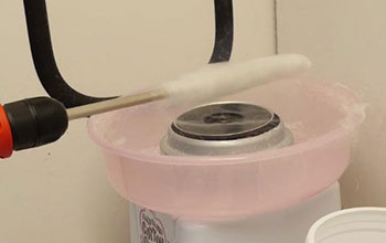 Part of a cotton candy machine