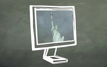 Computer monitor showing image of the Statue of Liberty