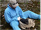 Scientist Andrew Storfer checks a Tasmanian devil for signs of devil tumor facial disease.
