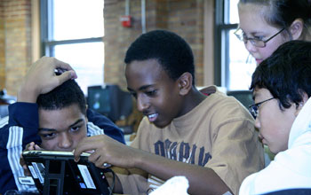 Photo of high school students using a digital game-based learning program.
