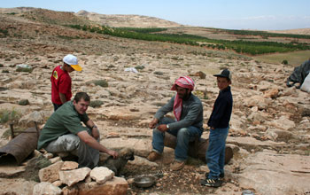 Photo of Ryan Boyko with Beduoin sheep herders whose dogs were sampled.