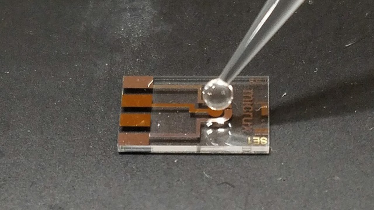 drop of water on a piece of hardware