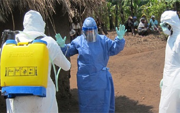 health workers in biohazard gear