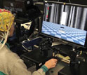 a person using equipment that may help rehabilitate Parkinson's disease patients.