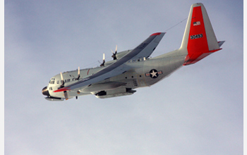Photo of a LC-130 Hercules flying over NSF's Amundsen-Scott South Pole Station.