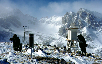 Researchers with equipment on mountain at NSF's Niwot Ridge LTER site.