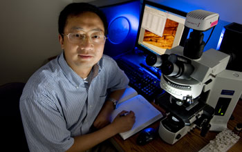 Shuhai Xiao, a professor of geobiology at Virginia Tech, is shown here in the lab