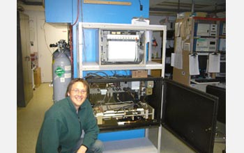 Photo of David Noone next to Charles Keeling's original CO2-monitoring equipment.