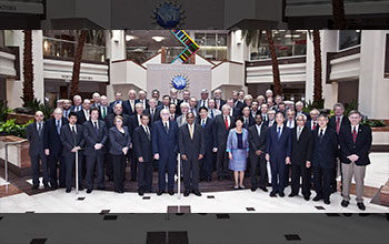 A group photo showing participants of the inaugural Global Summit on Merit Review