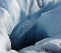 Water flowing from the surface to the bed of the Greenland ice sheet.