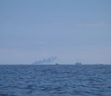 View of the Deepwater Horizon site and ships on the surface.