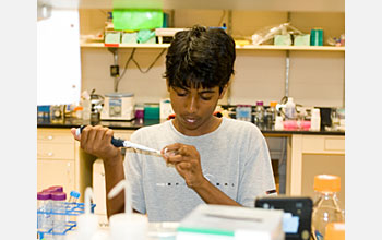 Photo of high school student in lab