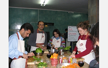 Students at the Petra workshop prepare a traditional Jordanian dinner.
