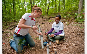 Photo of scientists Elizabeth Herndon and Danielle Andrews collecting samples.
