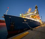 The ocean research drillship JOIDES Resolution is used to obtain samples from beneath the seafloor.