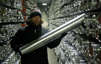 Brian Bencivengo, of the National Ice Core Laboratory, hold a segment of the WAIS ice core.