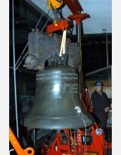 The Liberty Bell hangs after being hoisted out of its supports.