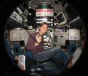 Photo of Anne Dekas collecting methane-seep sediments from the deep-sea submersible Alvin.