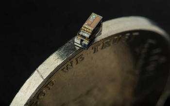 micro-biosensor on the side of a coin