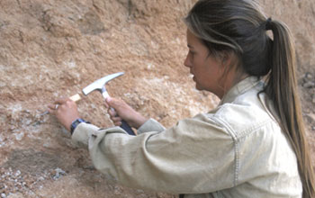 Photo of paleontologist Nancy Stevens at work in the Rukwa Rift Basin.