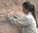 Photo of paleontologist Nancy Stevens at work in the Rukwa Rift Basin.