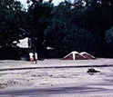 Photo of a house buried by a mudflow of volcanic ash and debris after Pinatubo's eruption.