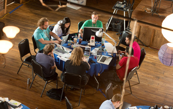 participants working on laptops at a Chattanooga hackathon