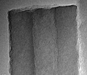Electron microscope image showing hollow zinc oxide nanotubes with single crystal lattice.