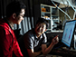 graduate student Xinwei Li, left, and postdoctoral researcher Weilu Gao