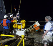 Night deployment of an ocean bottom seismograph.