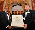 Photo of NSF Director Subra Suresh presenting the Alan T. Waterman Award to Casey Dunn.