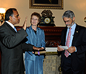 Subra Suresh, his wife, Mary, and White House science advisor John Holdren