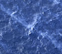 Oil sheens overlying the wreckage of the Deepwater Horizon seen from the air