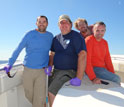 Photo of scientists on a boat: Valentine; Nelson; Kellermann, Reddy.