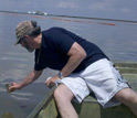 Scientists collect Gulf of Mexico oil samples for study of the oil degradation process.