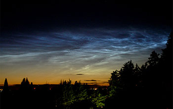 Noctilucent clouds (or "night-shining clouds") over Mount Tabor Park, Portland, Ore., July