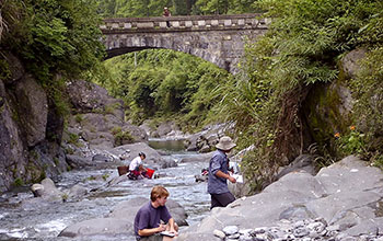 Researchers collect rock samples in the Yangtze Gorges area of South China