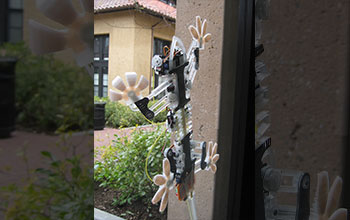 Stickybot, a robot whose feet are covered with gecko-inspired, directional-adhesive material