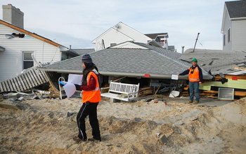 Researchers collect data on damaged buildings at Ortley Beach, New Jersey, after Hurricane Sandy.