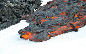 Ropey, a basaltic trachyandesite pahoehoe lava, flows across the snow
