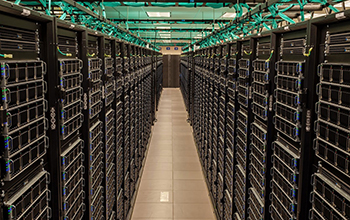 View between rows of Frontera supercomputer’s servers