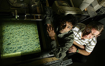 Engineer and physicist Bob Behringer and graduate student Trushant Majmudar