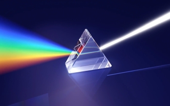 prism with light refracting through it