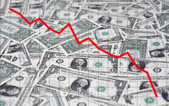 Illustration showing a pile of dollar bills and a red line going down
