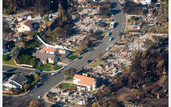 Photo of a California neighborhood devastated by a wildfire in October 2007.