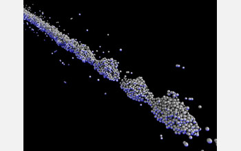 High-speed photograph of fluidized dry granular particles.