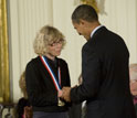 Photo of Joanna Fowler receiving the National Medal of Science from President Barack Obama.