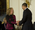 Photo of Elaine Fuchs receiving the National Medal of Science from President Barack Obama.